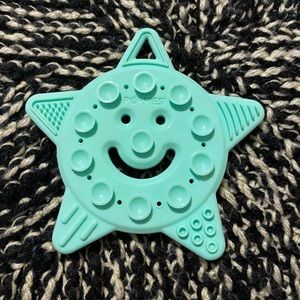 Poppies smiley the Star mint green teething toy